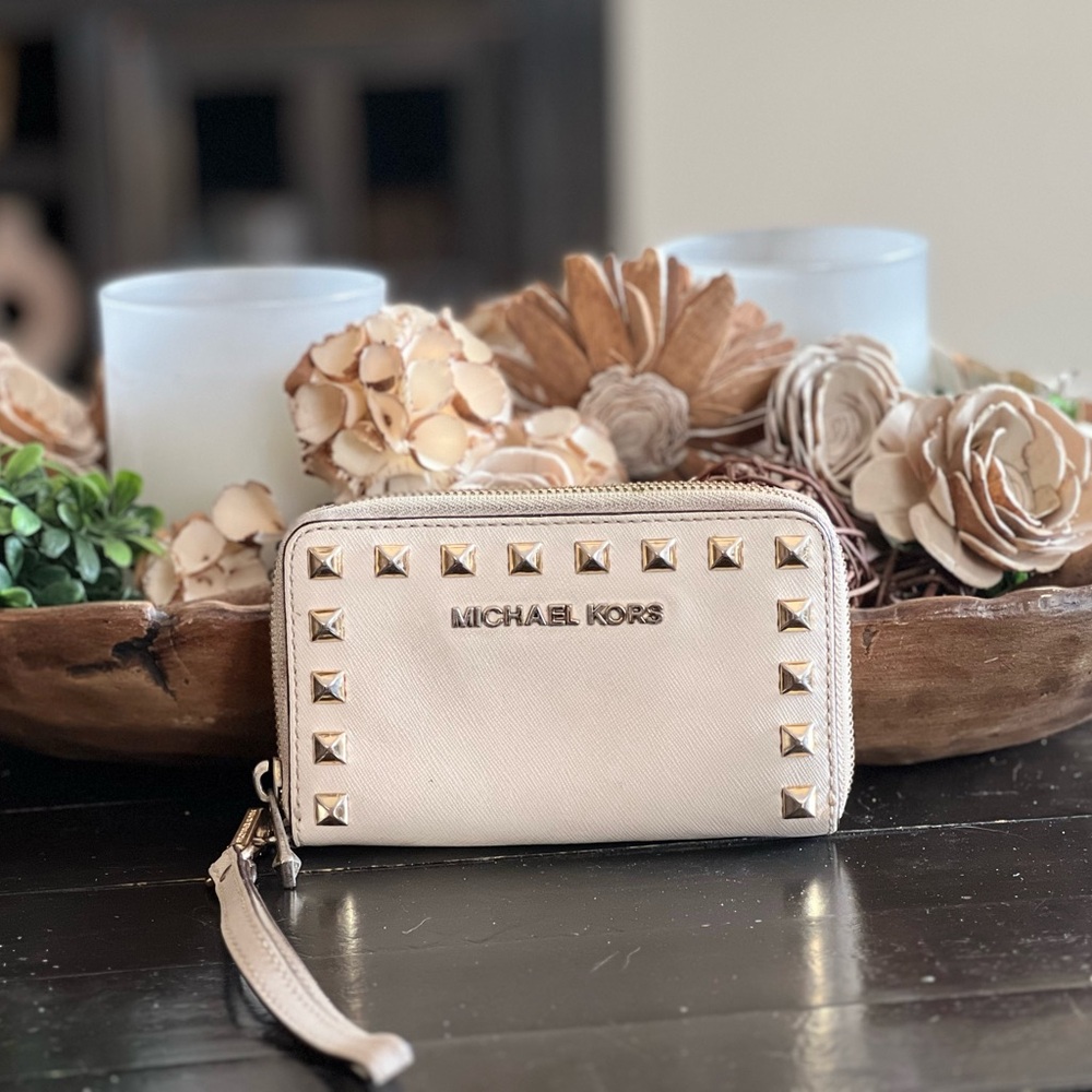Michael Kors Cream Saffiano
Leather Selma Clutch/Wristlet with gold studs